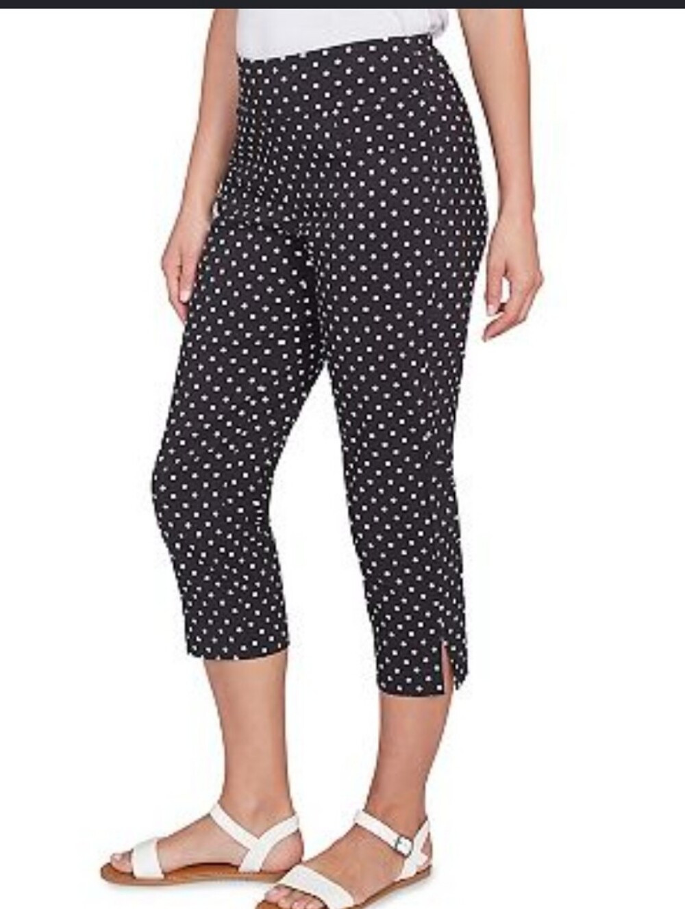 Faded Glory black & white stretchy panst w flowers. Women’s size (14) 27”…